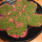 焼肉問屋 牛蔵 - ねぎタン塩：二つに折って両面を焼く