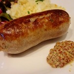 ビストロ ミツ - どっしりしたソーセージに、粒マスタードが添えられています