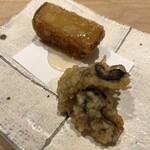鮨 一二郎 - 小ぶりですが旨みがジュワッと広がる牡蠣の天ぷらと、さつまいも蜂蜜バター。こちらも夏の名残りと秋の始まりを感じさせます。