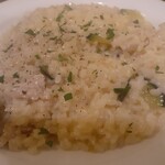 オステリア ピテカントロポ - 豚肉とズッキーニのリゾット