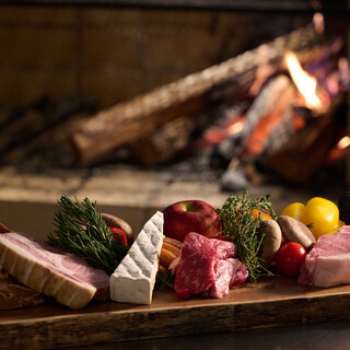 The carefully selected ingredients are cooked over a wood fire.