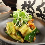 Seared cucumber with plum meat