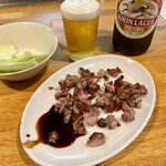 鳥林 - 名物の皮。タレが美味しい。