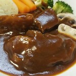 キッチン ブルー グローブ - 牛すね肉のシチューのアップ