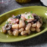 Octopus and white beans marinated with anchovies
