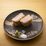 Rare pork cutlet cooked at low temperature