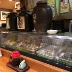 Mangetsu - ネタケースには魚が並んでいます