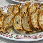 餃子の王将 - 餃子313円。素晴らしい焼き加減！