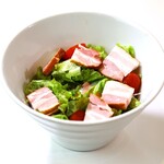 Caesar salad with grilled bacon