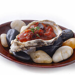 Baked Oyster with onion, chili and tomato sauce and bacon