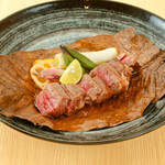 Grilled Japanese black beef with magnolia leaves