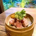 Steamed Isumi pork belly with vegetables wrapped in bamboo basket