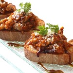 Oyster, bacon and sun-dried tomato bruschetta (2 slices)