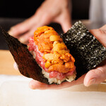 Sea urchin and tuna hand roll with dried seaweed