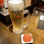 立呑み 魚椿 - 生ビールとお通しの明太子