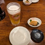 ふなっ子 - とりあえずの生ビールとお通しのイカの塩辛