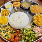 あちゃーる - 本日のターリー(カレー2種)@2,000円  仙台の郊外でこの値段でやっていけるのはやっぱり美味しいからだよね！ご飯にあうおかずがズラーっと並んでいて、どれをどれと混ぜても美味しくなっちゃう！