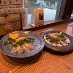 Takeokamachi Umibare - 少し食べて慌てて撮った写真。伝われば良いのだが、左の鯛胡麻は来た人もれなく食べてほしいな