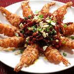 Fragrant fried shrimp with shells and chili peppers