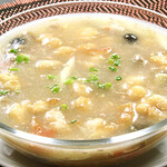 Sour and mustard soup with white fish