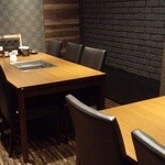 薩摩焼肉　黒桜 - 半個室のような部屋（6人掛け×2）～♪(^o^)丿