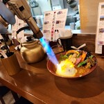 スープカレー奥芝商店 - 最後の仕上げです。