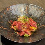 すみび焼肉　Da-Wa - 卵黄とタレが絡まっていい感じです。ネギの食感がいいアクセントになってます。