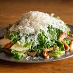 Kale salad with grilled bacon and pecorino cheese