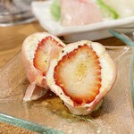 Strawberry and cheese wrapped in Prosciutto