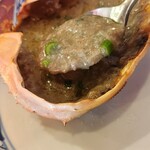 磯丸水産 - 一番人気甲羅焼き