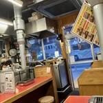 焼肉亀田 - 店内　メニューはぶら下げ型