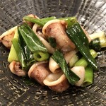 Grilled spear squid and green onion with yuzu pepper