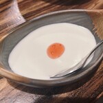 鉄板・鍋奉行 あんき家 - お通し。ココナッツミルクの杏仁豆腐？