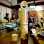 田舎料理おかりば - 竹筒の日本酒［by pop_o］