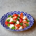 Caprese with strawberries, tomatoes, and buffalo mozzarella