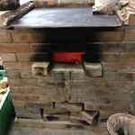 居魚屋　網元 - 煉瓦の薪ストーブ
