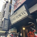 TOM TOKYO - お店入り口の看板