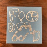 フードムード - なんだかかわいい箱だけど、左上のリーゼントのおにーさんは思案中かなー