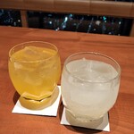Kunimi - あらごしみかん酒とあらごしゆず酒　それぞれソーダ割り　各700円