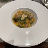 トラットリア イル レガーロ - 冬野菜のミネストラ　※かなり色々な野菜が入っています。肉はパンチェッタやトリッパを刻んだものが入っているみたいでした。