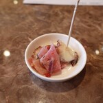 MONK - お通しのタコと赤大根のマリネ