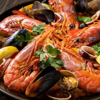 A luxurious Seafood paella with a generous serving of Seafood ingredients.