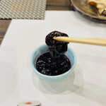 つかさ - タラバガニの内子のヅケ。
      これを食べるために年数回函館に行きます。