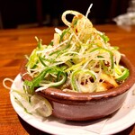 Spicy Ajillo with beef offal and heaps of green onions