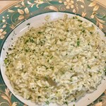Ristorante La Sagrestia - 料理写真:ワイフのプリミはカルチョーフィたっぷりのリゾ　ペコリーノも効いていて抜群の美味さ　あれこの店こんなに美味しかったか？