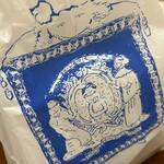 西洋菓子 しろたえ - ビニールの入れ物。