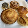 フレッシュベーカリー ノア - 料理写真:ごまあんぱん キリマンジャロチョコ？ かぼちゃあんぱん
コロッケぱん？ 牛乳パン