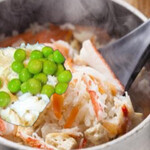 Snow crab and bamboo shoots topped with Kamameshi (rice cooked in a pot) roe