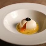 Soft-boiled egg with hollandaise sauce and caviar