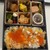 秋田料理 わったりぼうず - 料理写真:スモークサーモンといぶりがっこのお寿司。